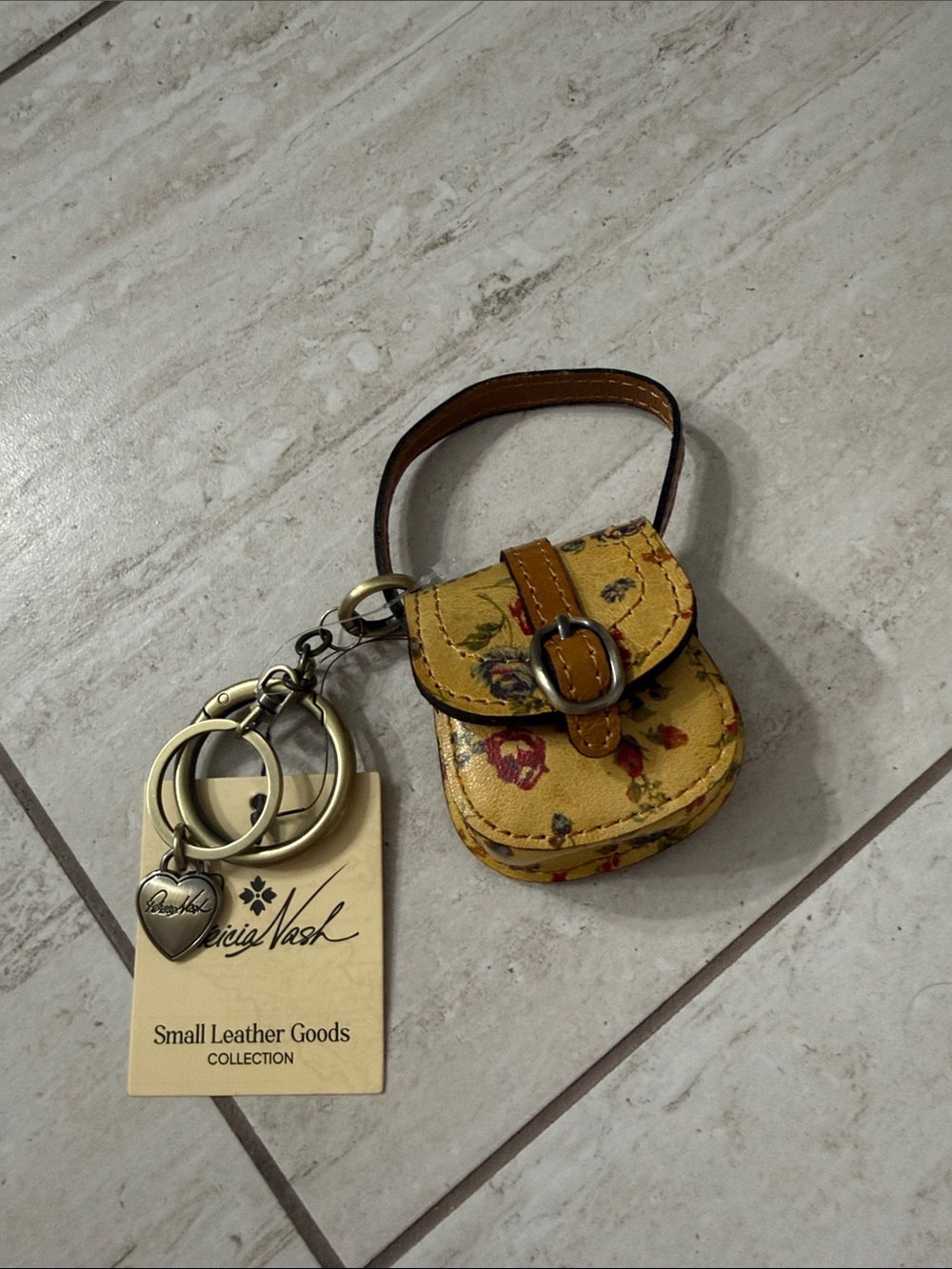 Patricia Nash Brass-Tone Keyring with Tan Tag..nwt.authentic..leather